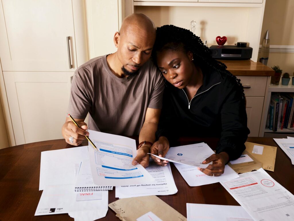 Family reviewing indexed universal life insurance policy